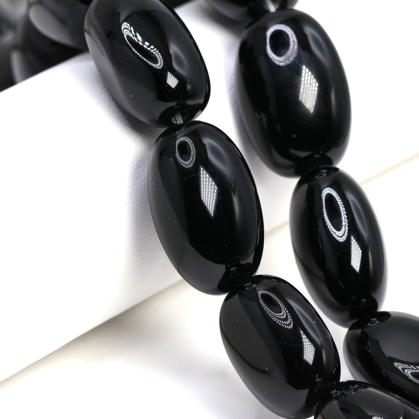 Black Onyx 25x15mm Smooth Nuggets Bead Strand