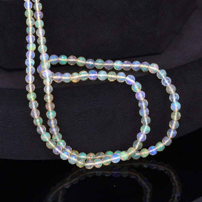Warm White Ethiopian Opal 3mm - 4mm Hand Faceted Rounds Bead Strand