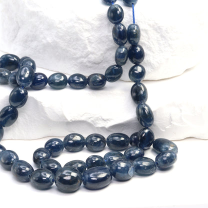 Blue Sapphire 5x7mm - 6x8mm Smooth Nuggets Bead Strand