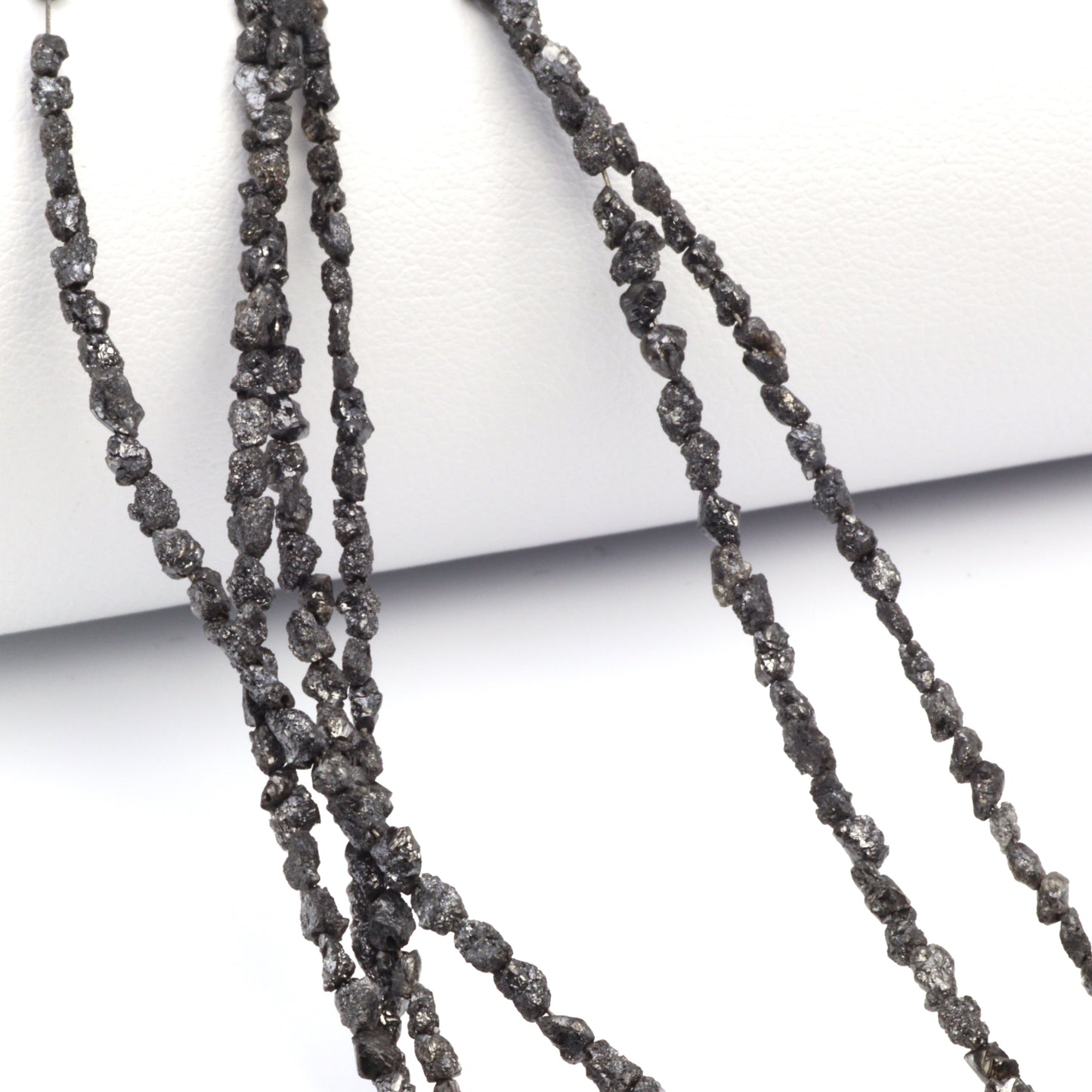 Black Diamond 3x2mm - 4x3mm Faceted Chips Bead Strand