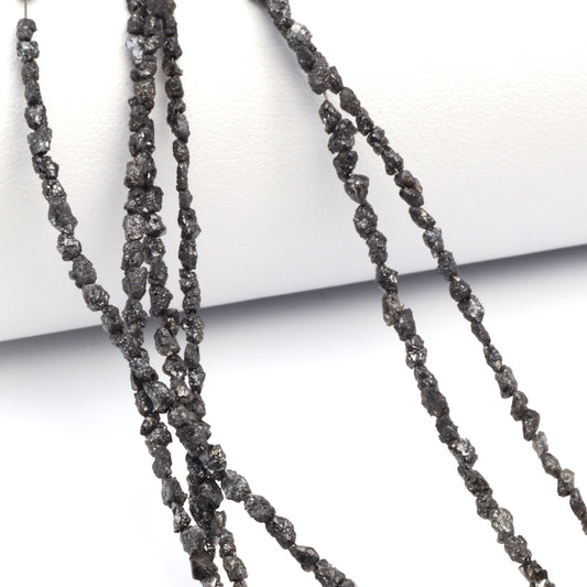 Black Diamond 3x2mm - 4x3mm Faceted Chips Bead Strand