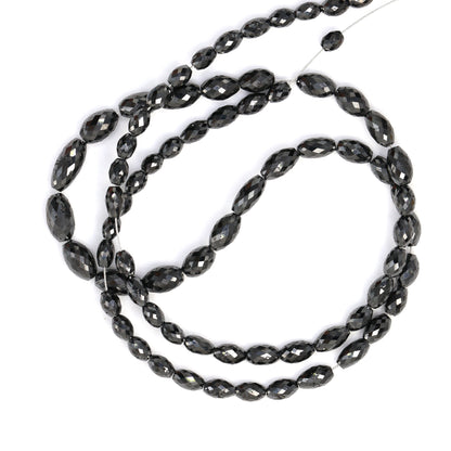 Black Diamond 5x3mm - 9x4mm Faceted Drums Bead Strand