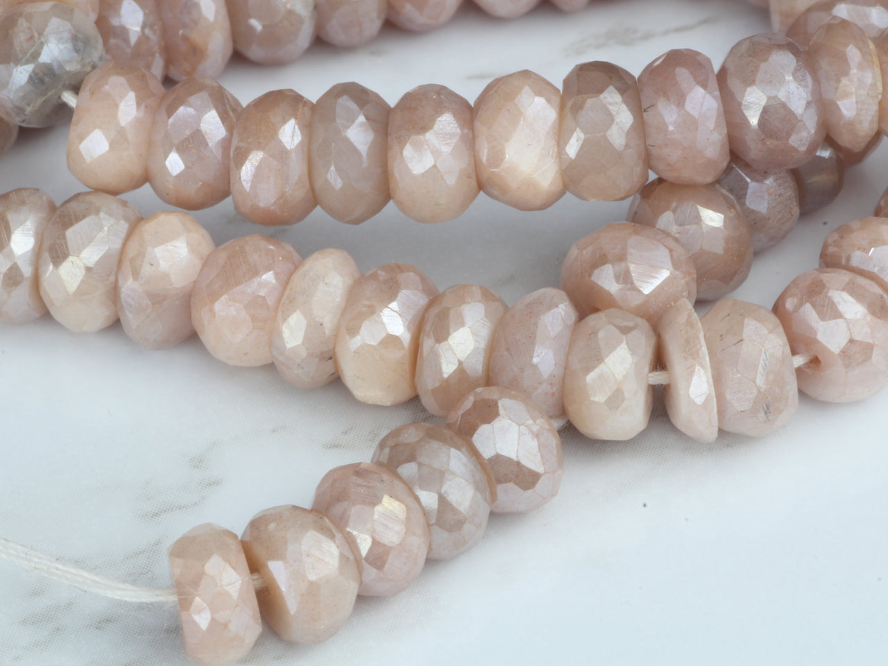Coated Peach Moonstone 7mm Faceted Rondelles