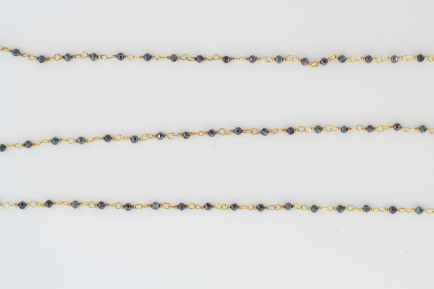 Coated Black Spinel 2mm Faceted Rounds