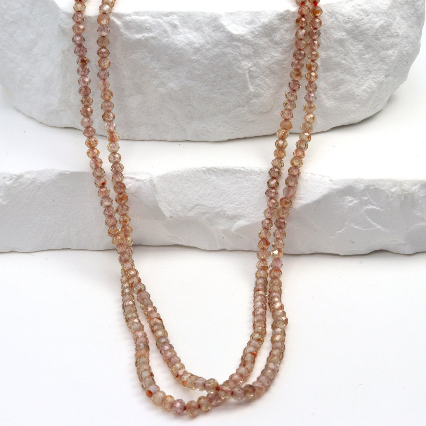 Light Red Zircon 2.5mm Faceted Rounds