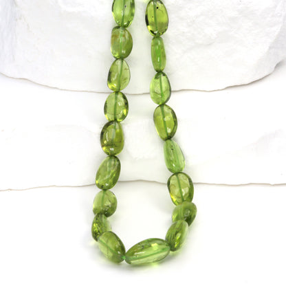AA Green Peridot 8x6mm - 10x7mm Smooth Nuggets Bead Strand