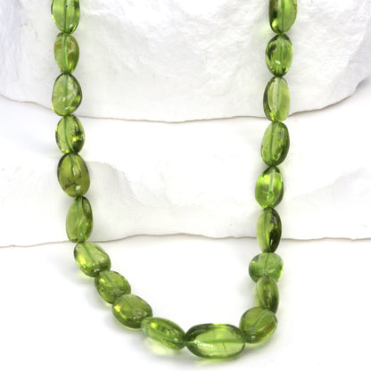 AA Green Peridot 8x6mm - 10x7mm Smooth Nuggets Bead Strand
