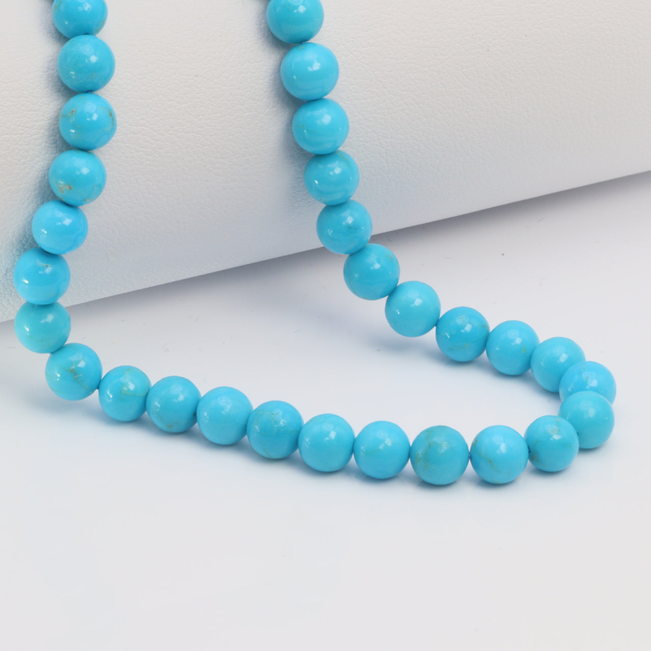 Sleeping Beauty Turquoise 5.5mm Smooth Rounds