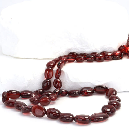 Red Garnet 6x4mm - 9x7mm Smooth Ovals Bead Strand