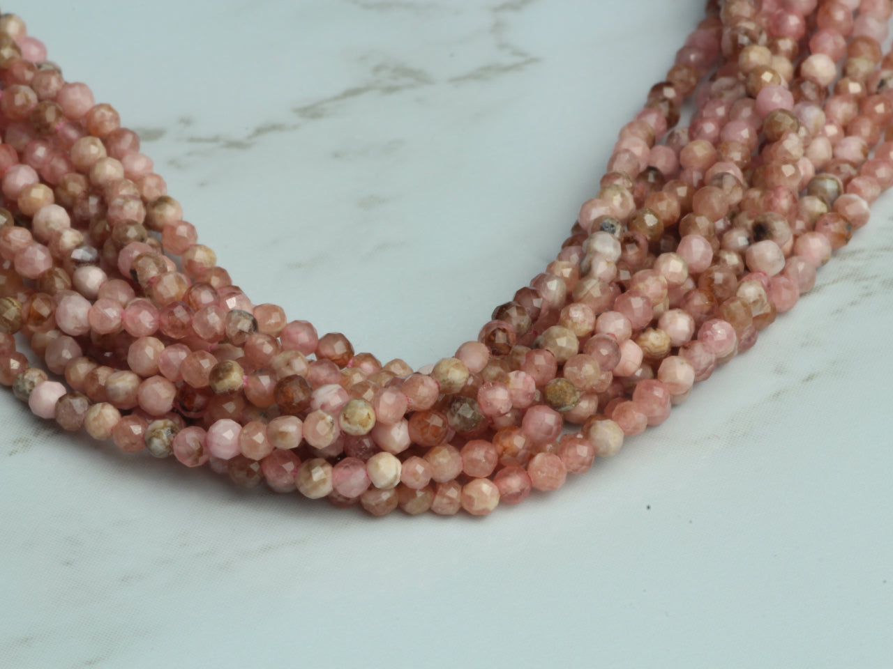 Pink Rhodochrosite 2mm Faceted Rounds