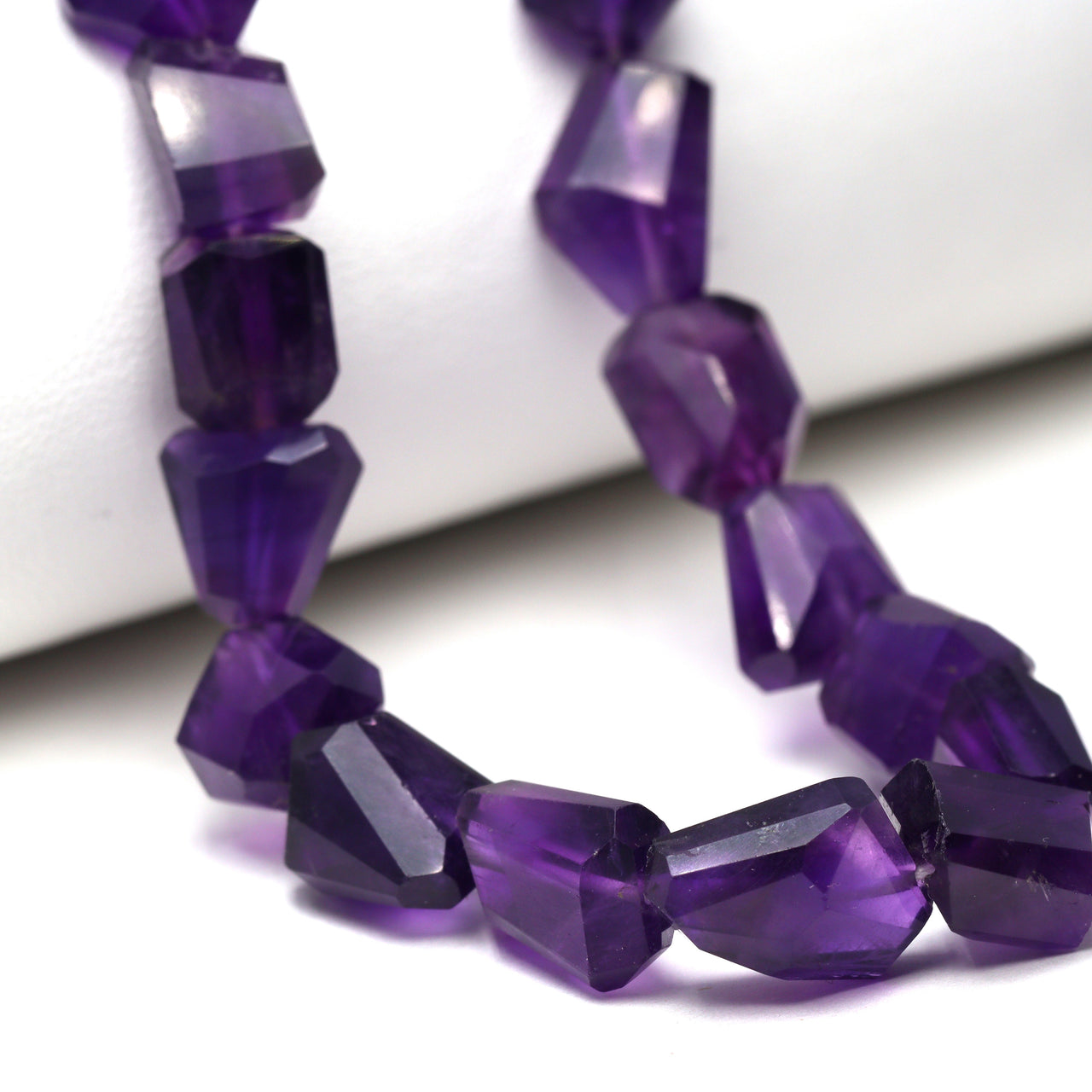 Purple Amethyst 10x8mm - 11x9mm Faceted Nuggets Bead Strand