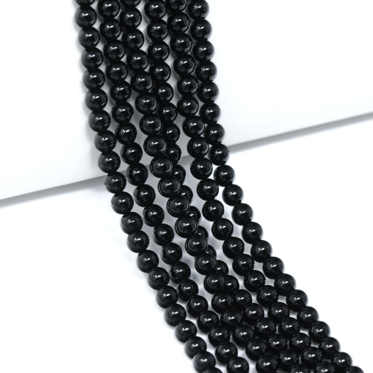 Black Onyx 4mm Smooth Rounds Bead Strand