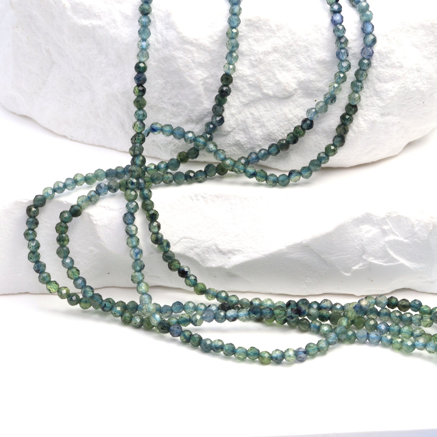 Ombre Blue Sapphire 2mm Faceted Rounds