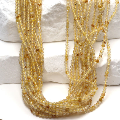 Golden Rutilated Quartz 2mm Faceted Rounds