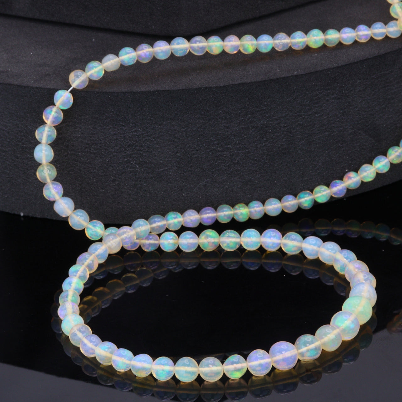 Yellow Ethiopian Opal 4mm - 5.5mm Smooth Rounds Bead Strand