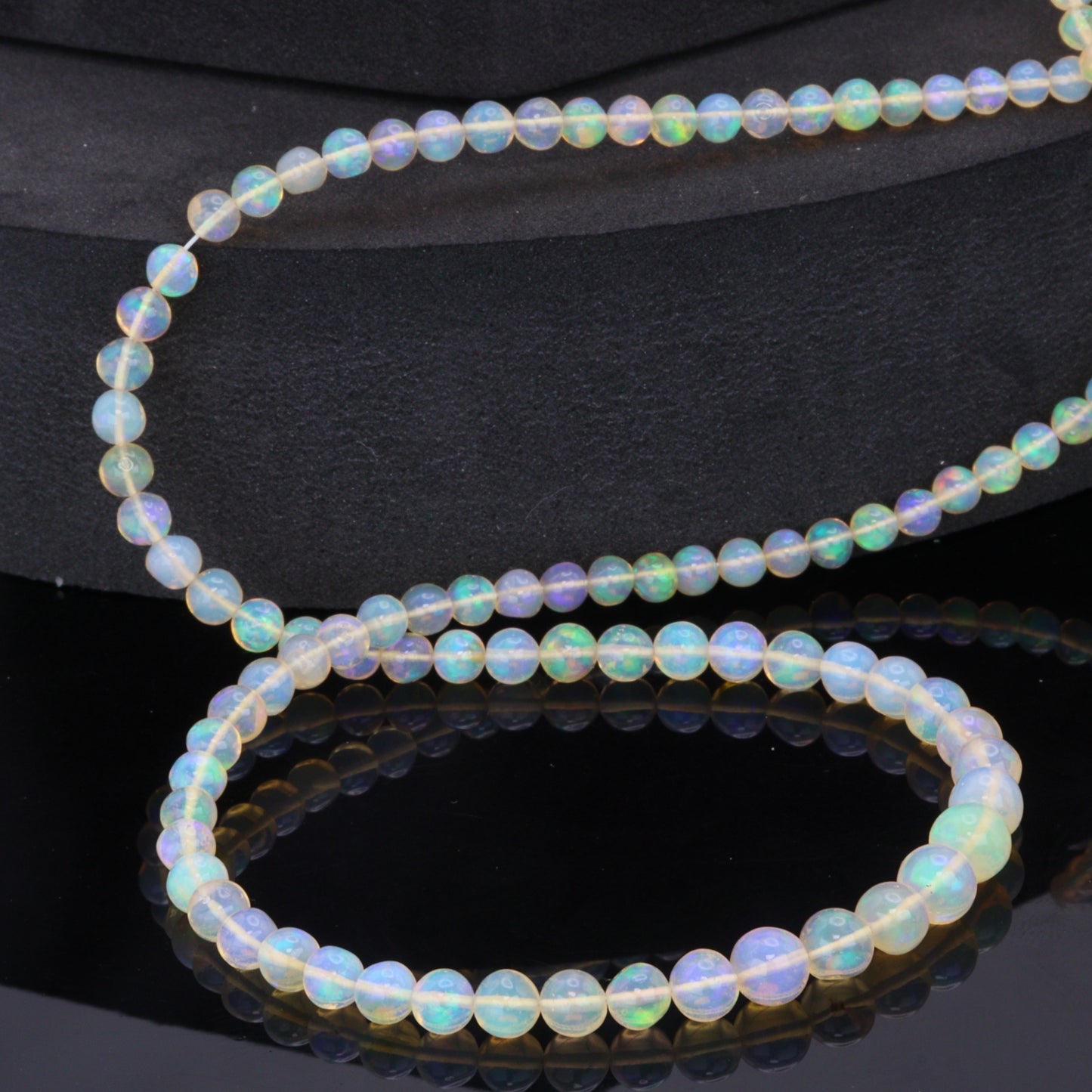 Yellow Ethiopian Opal 4mm - 5.5mm Smooth Rounds Bead Strand