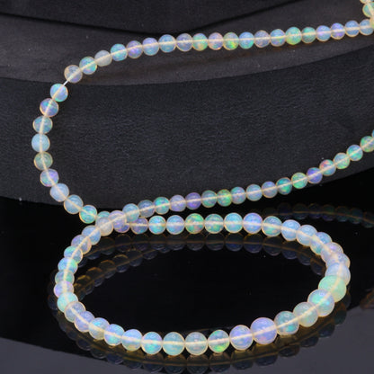 Yellow Ethiopian Opal 4mm - 5.5mm Smooth Rounds Bead Strand