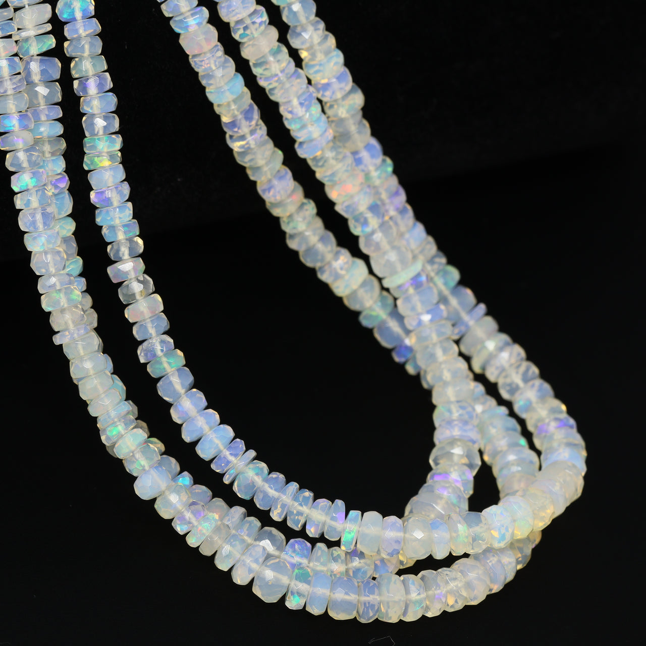 White Ethiopian Opal 4mm – 6mm Hand Faceted Rondelles Bead Strand