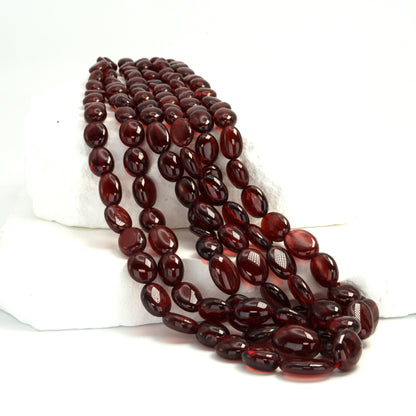 Red Garnet 6x4mm - 9x7mm Smooth Ovals Bead Strand