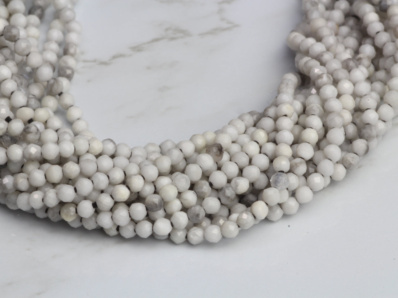 White Howlite 2mm Faceted Rounds