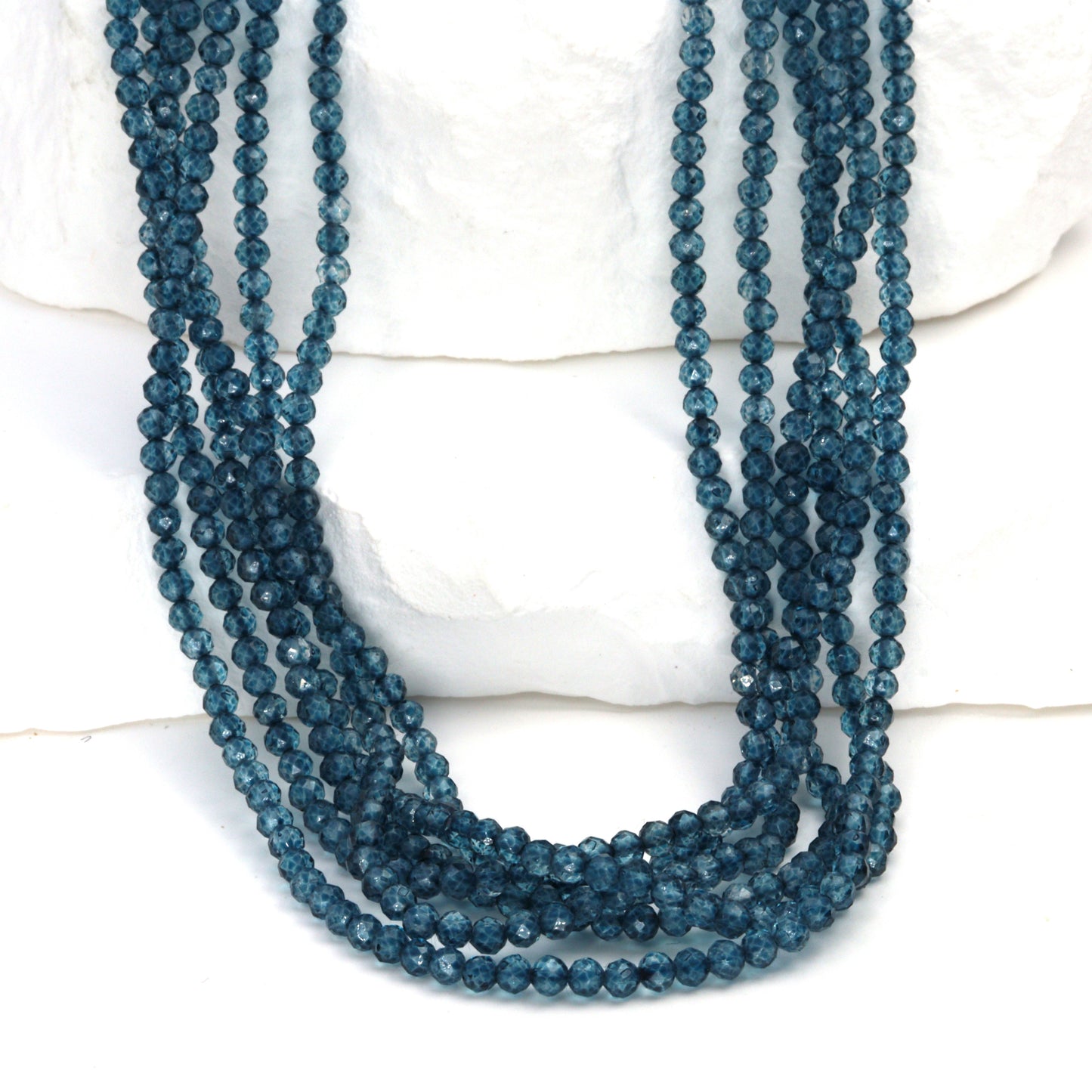 Coated London Blue Quartz 2.5mm Faceted Rounds