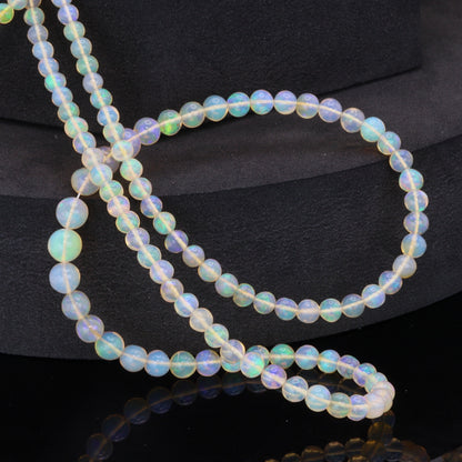 Yellow Ethiopian Opal 4mm - 5.5mm Smooth Rounds Bead Strand
