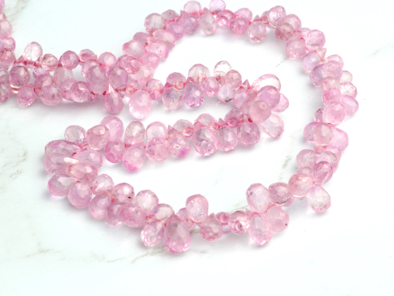 Light Pink Sapphire 4x2mm - 5x3mm Faceted Teardrop Briolettes Bead Strand
