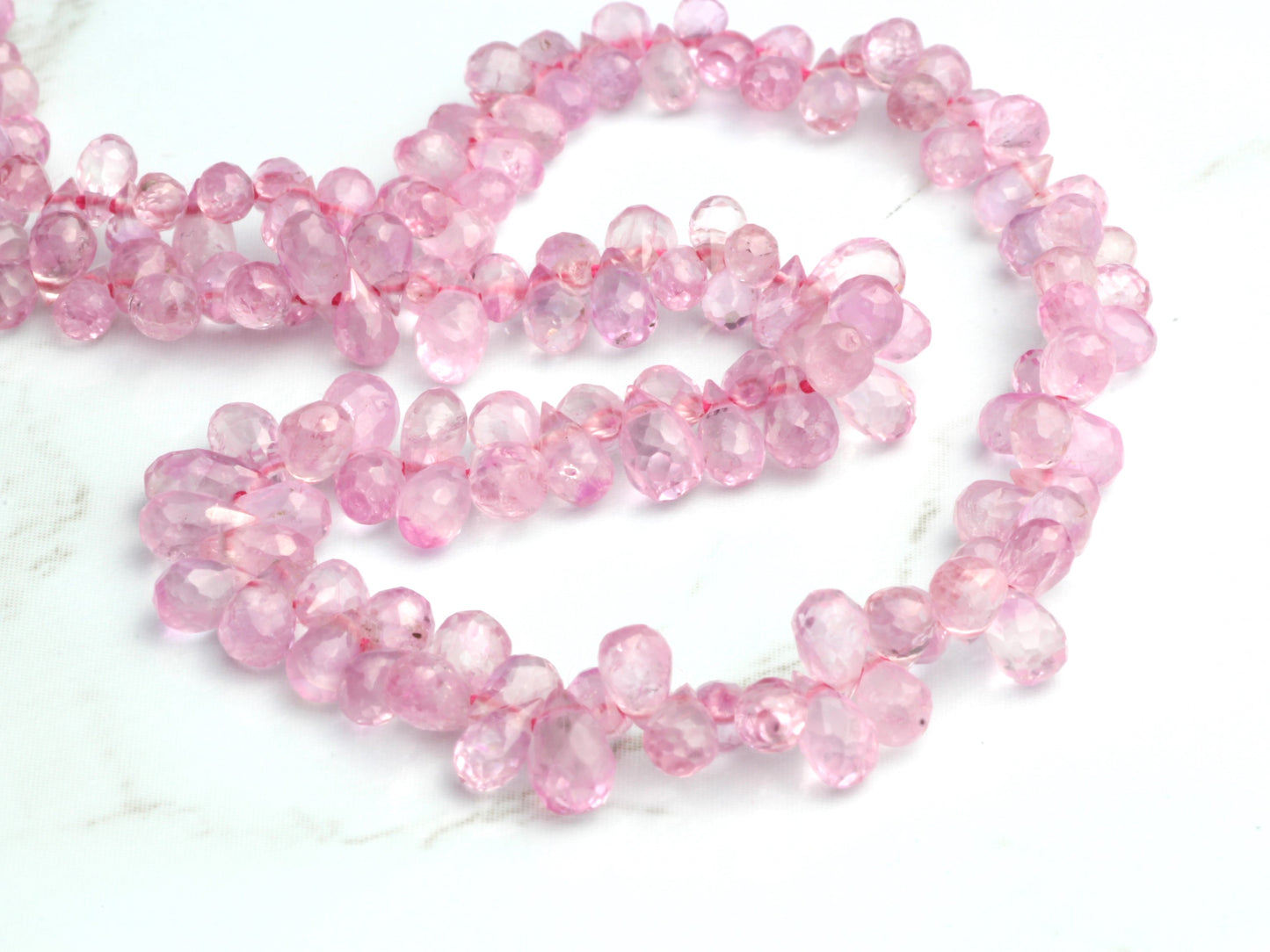 Light Pink Sapphire 4x2mm - 5x3mm Faceted Teardrop Briolettes Bead Strand