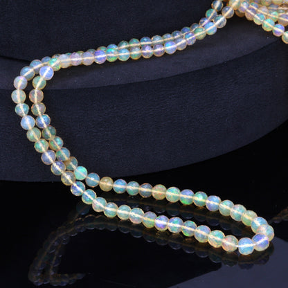 Yellow Ethiopian Opal 4mm - 5mm Hand Faceted Rounds Bead Strand