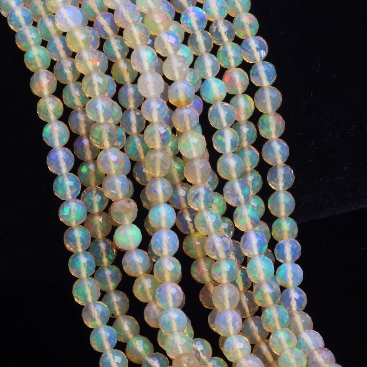 Yellow Ethiopian Opal 4mm - 5mm Hand Faceted Rounds Bead Strand