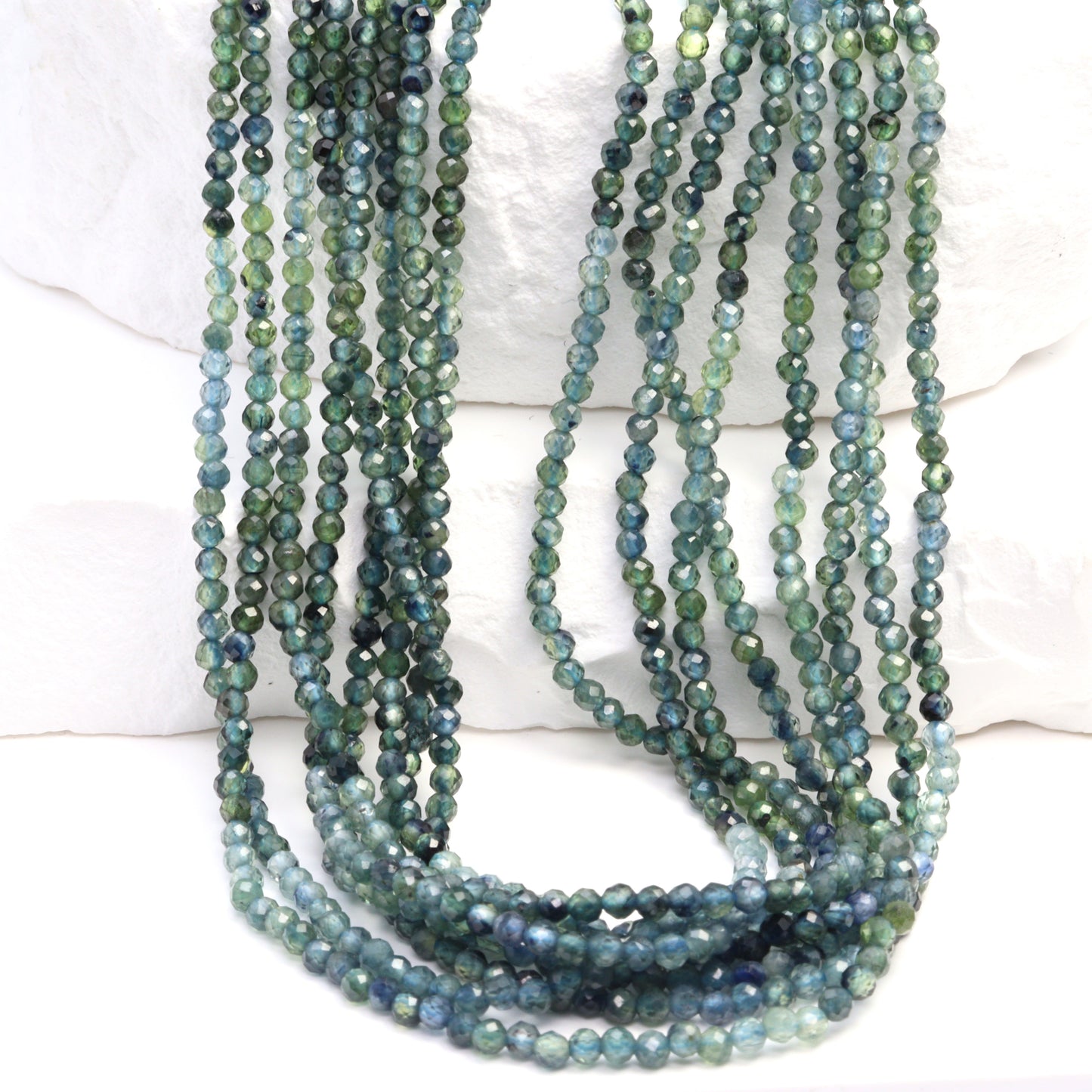 Ombre Blue Sapphire 2mm Faceted Rounds