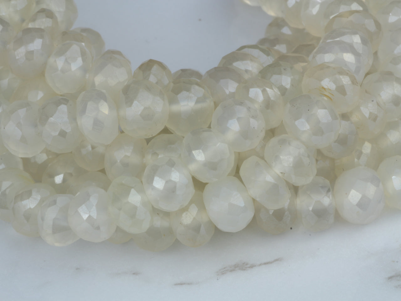 Coated White Chalcedony 7mm Faceted Rondelles