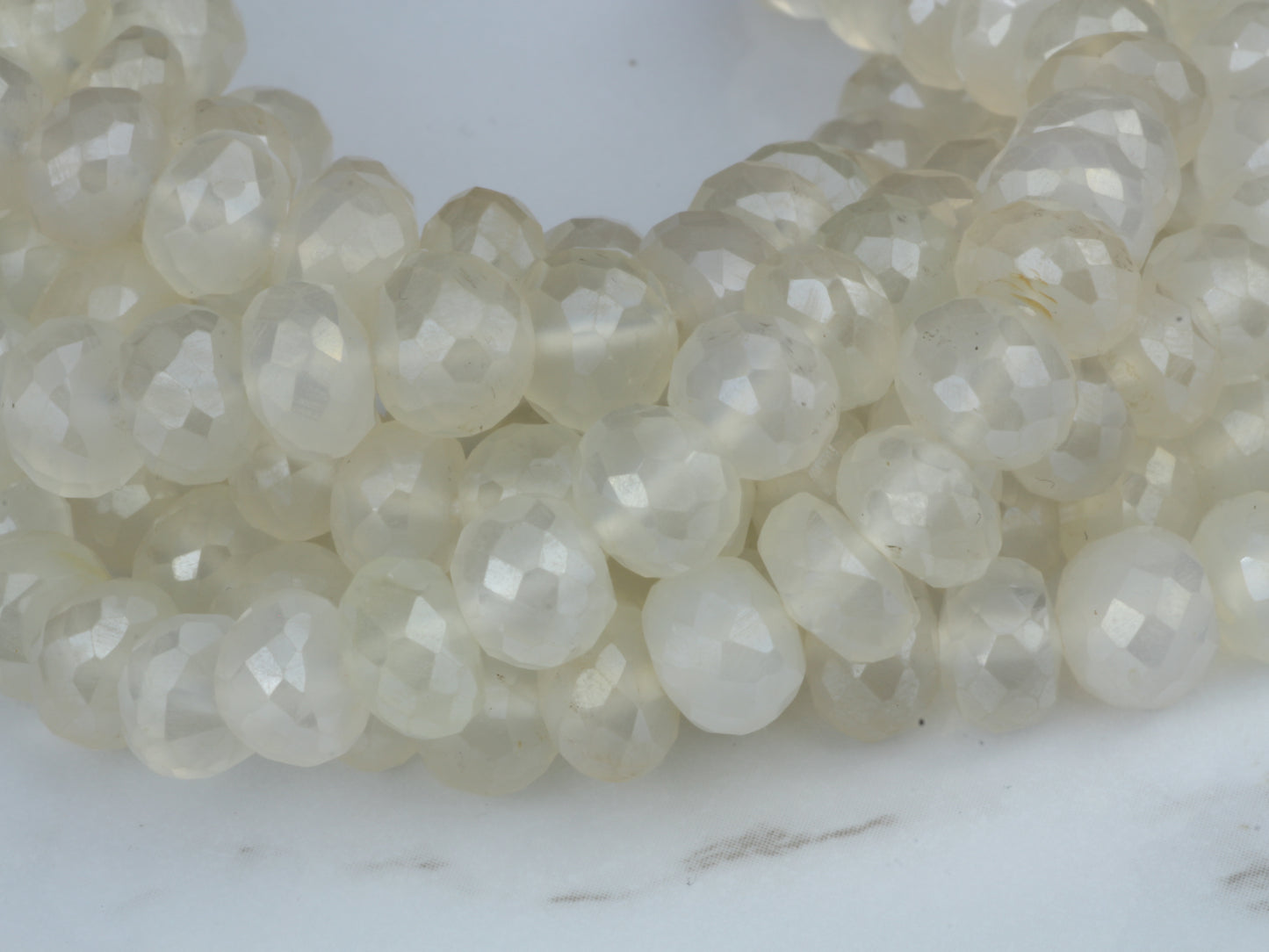 Coated White Chalcedony 7mm Faceted Rondelles