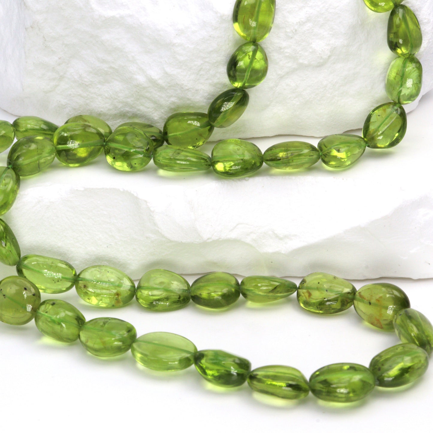 AA Green Peridot 9x7mm - 10x8mm Smooth Nuggets Bead Strand