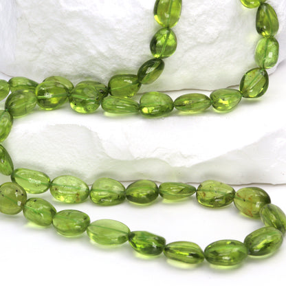 AA Green Peridot 9x7mm - 10x8mm Smooth Nuggets Bead Strand