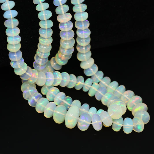 White Ethiopian Opal 6mm – 9mm Smooth Rondelles Bead Strand