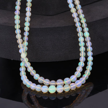 Yellow Ethiopian Opal 4mm - 5.5mm Smooth Rounds Bead Strand