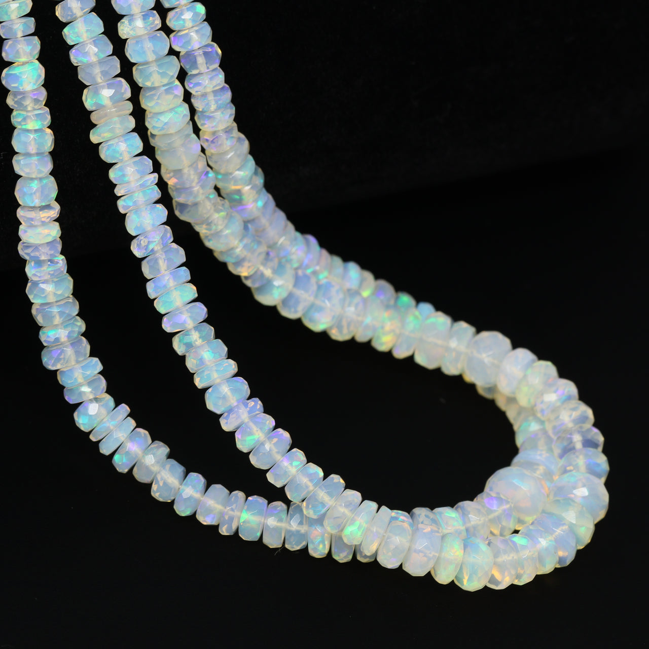 White Ethiopian Opal 4mm – 7mm Hand Faceted Rondelles Bead Strand