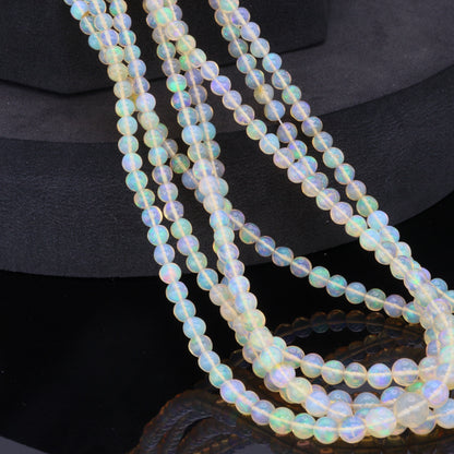Yellow Ethiopian Opal 4mm - 5.5mm Smooth Rounds Bead Strand