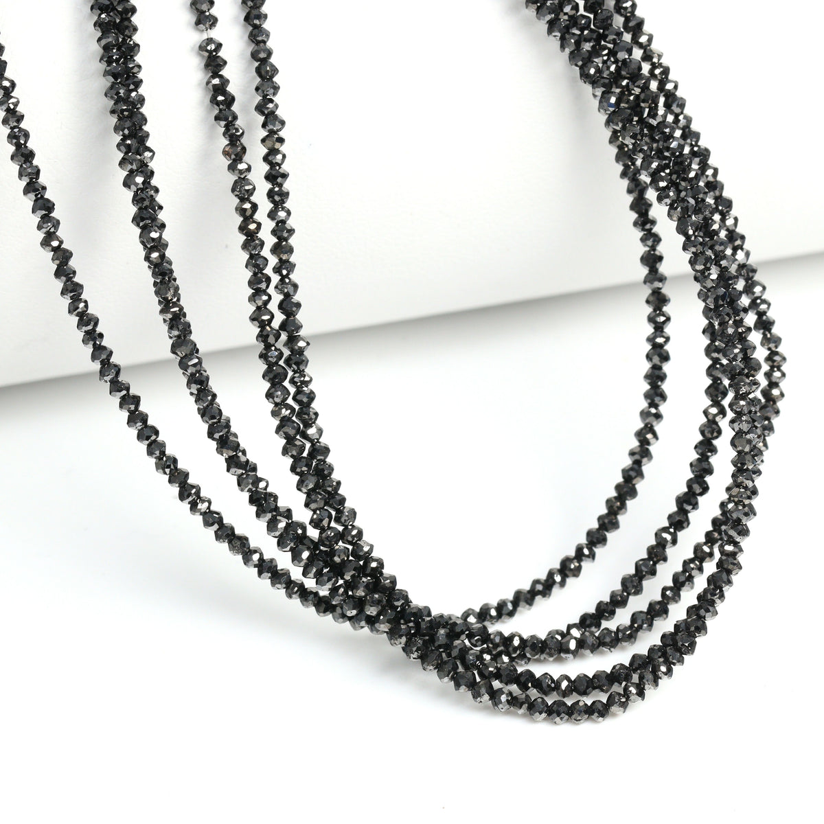 Black Diamond 1.8-2.2mm hand faceted rondelle beads, 16 in strand, main view