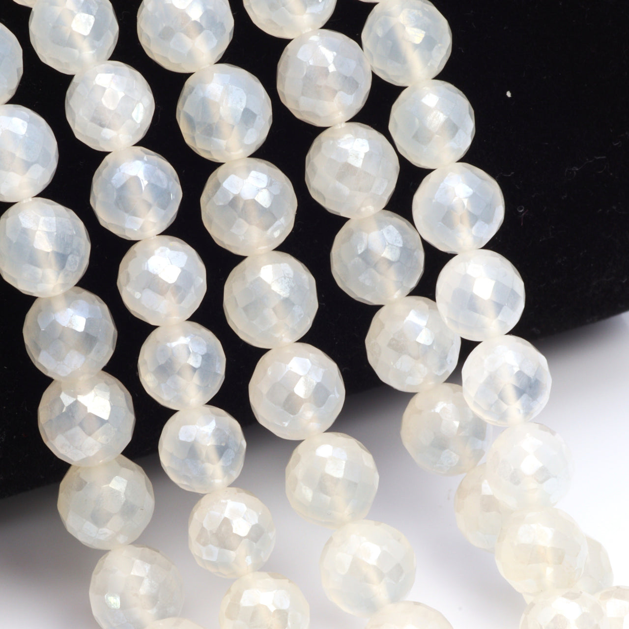 Coated White Chalcedony 8mm Faceted Rounds