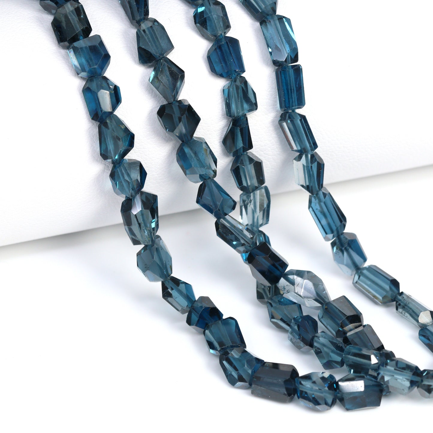 London Blue Topaz 7x6mm Faceted Nuggets Bead Strand