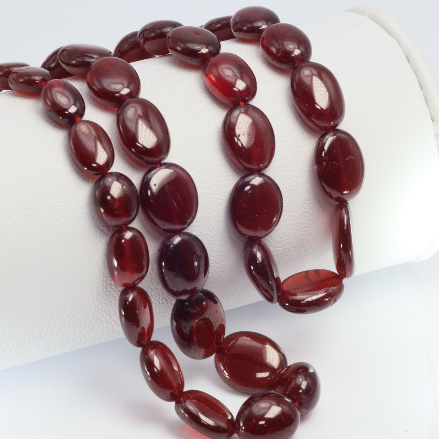 Red Garnet 6x4mm - 9x7mm Smooth Ovals Bead Strand