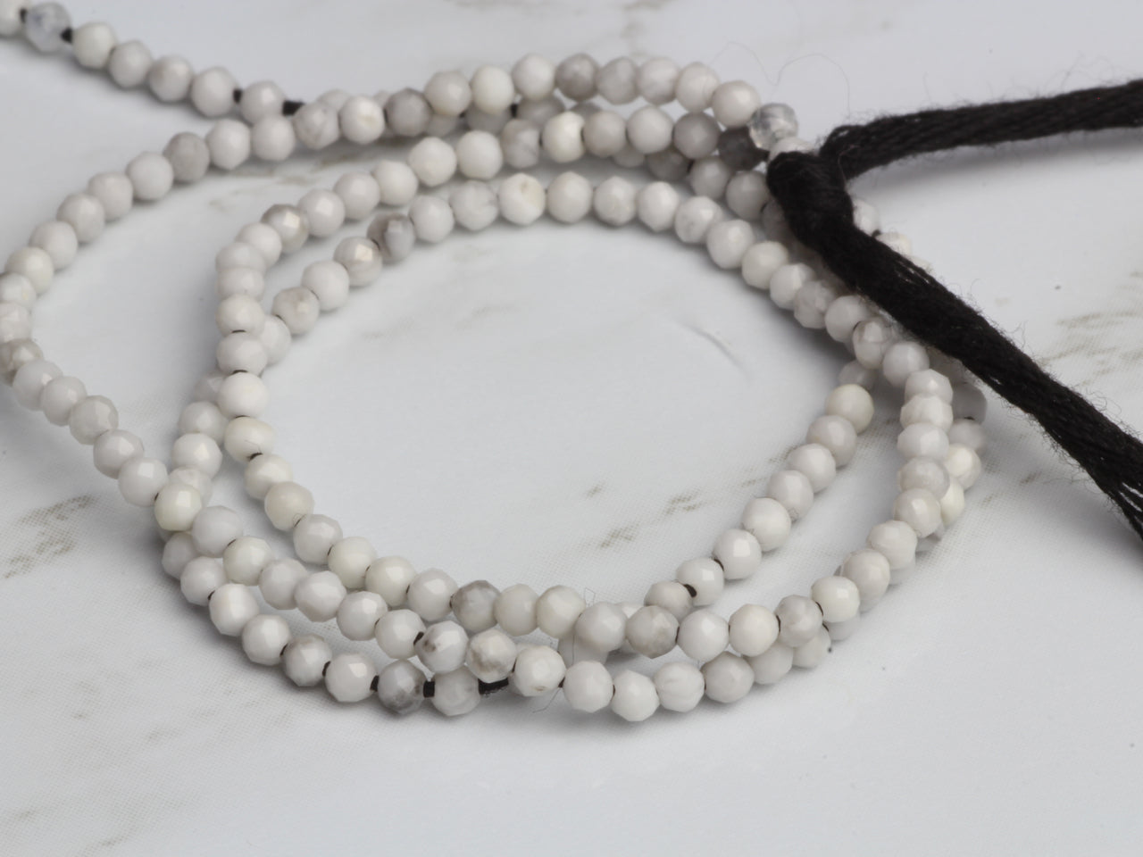 White Howlite 2mm Faceted Rounds