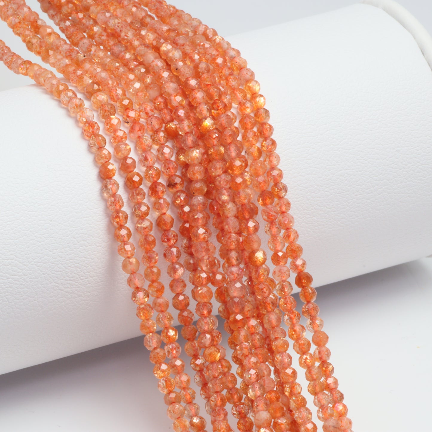 Orange Sunstone 2.5mm Faceted Rounds