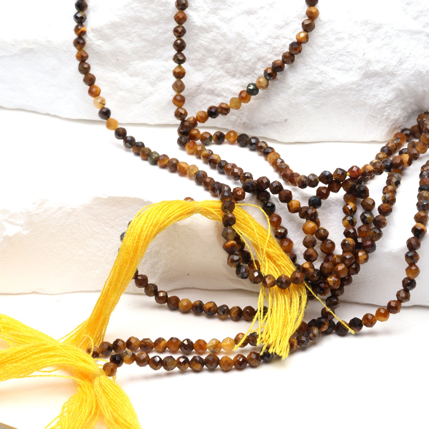 Tiger's Eye 2mm Faceted Rounds