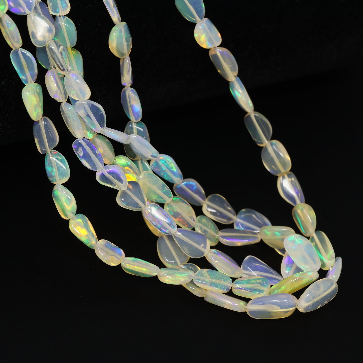 White Ethiopian Opal 5x3mm – 7x5mm Smooth Nuggets Bead Strand