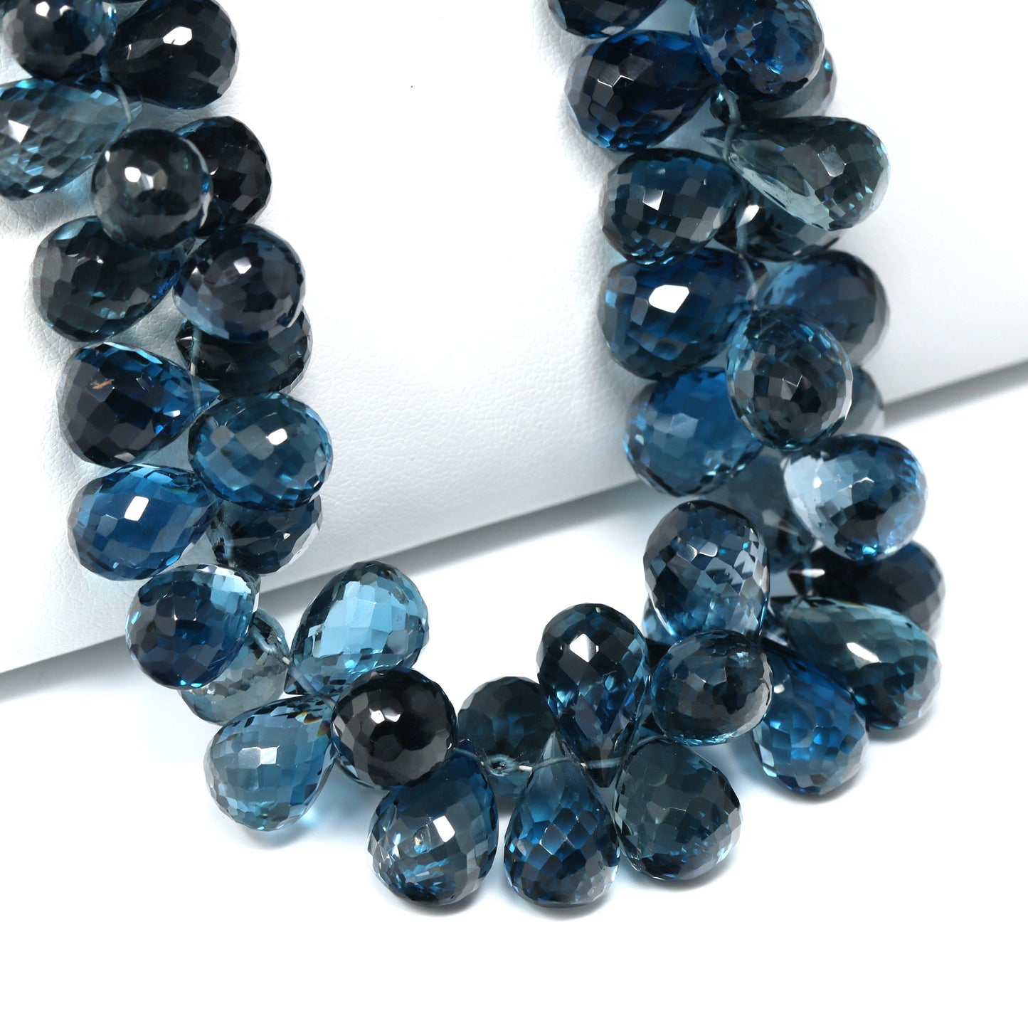 London Blue Topaz 10x7mm – 11x8mm Faceted Teardrop Briolettes Bead Strand