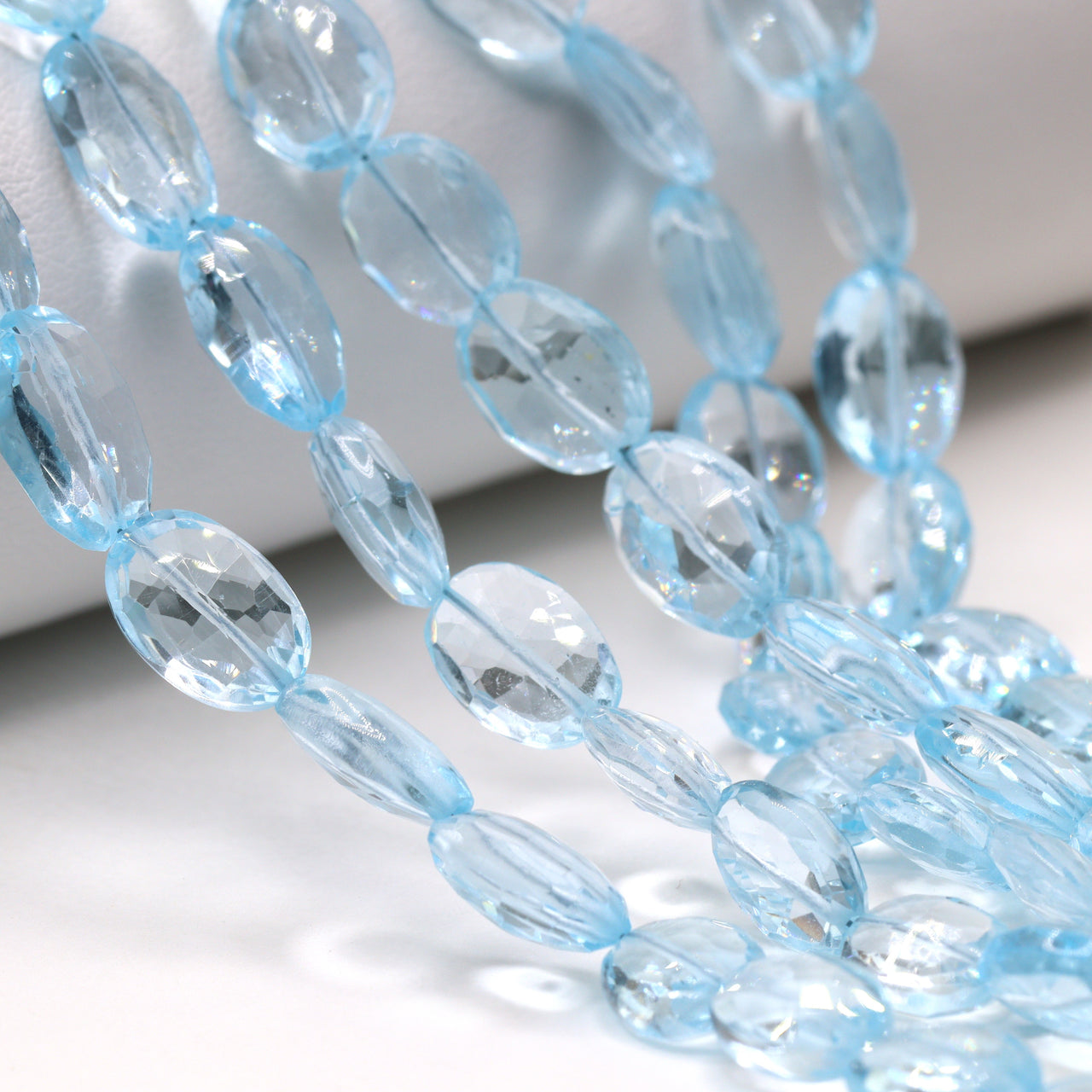 Sky Blue Topaz 8x7mm - 11x8mm Faceted Ovals Bead Strand