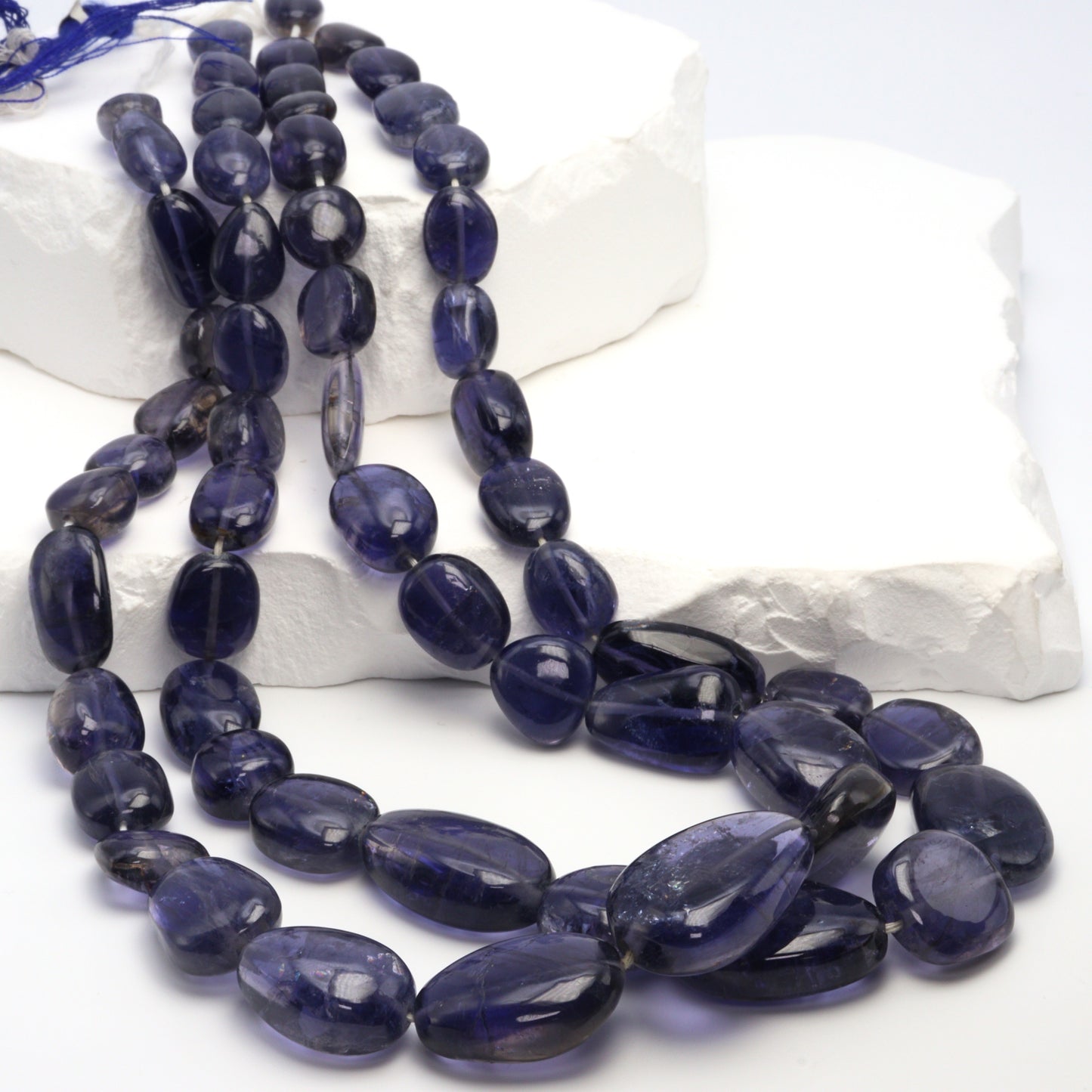 Blue Iolite 20x10mm - 25x15mm Smooth Ovals Bead Strand